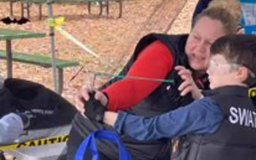 a man holding a child