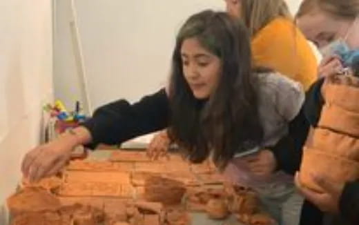 a woman sitting at a table