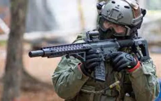 a soldier holding a gun