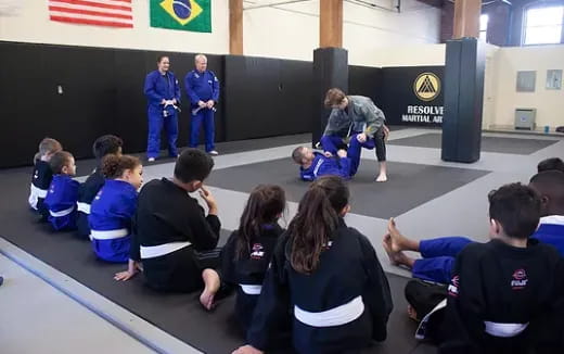 a group of people sitting on the floor