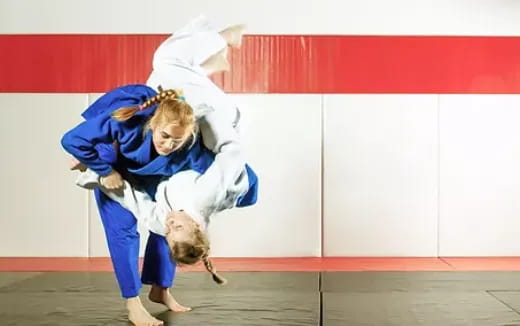 a couple of women in blue uniforms