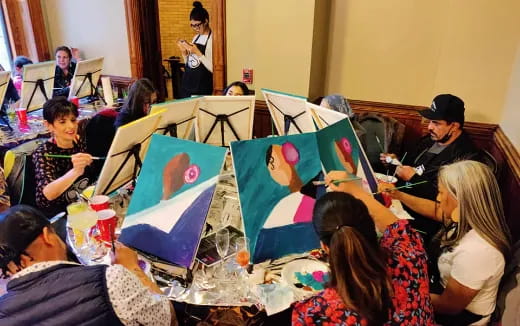 a group of people sitting in a room