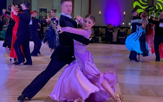 a man and woman dancing