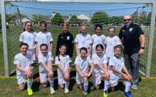 a group of people posing for a photo