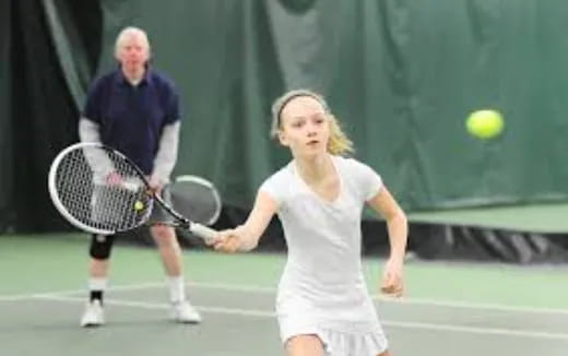 a woman playing tennis