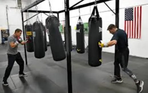 a man spraying a man's leg