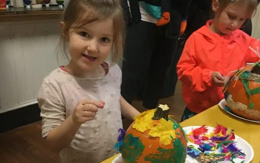 a young girl eating cake