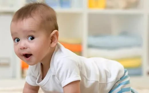 a baby with a surprised expression