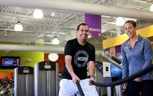 a man and a woman smiling