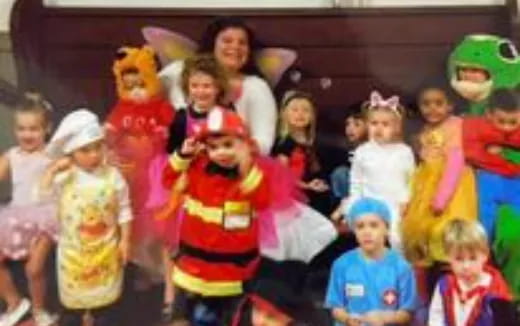 a group of children in clothing