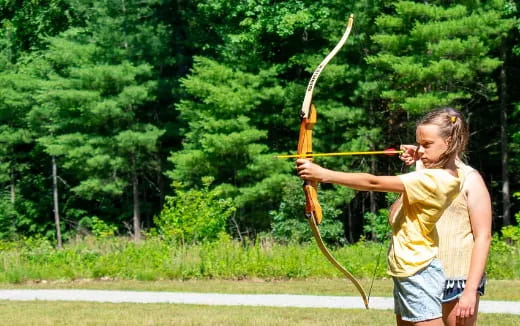 a man shooting a bow