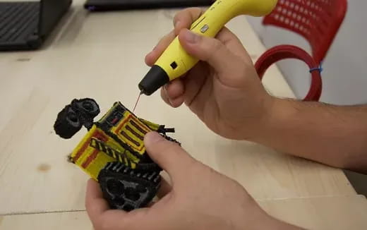 a person cutting a banana