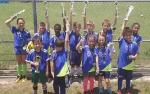 a group of people in sports uniforms