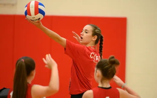 a person hitting a ball with the head