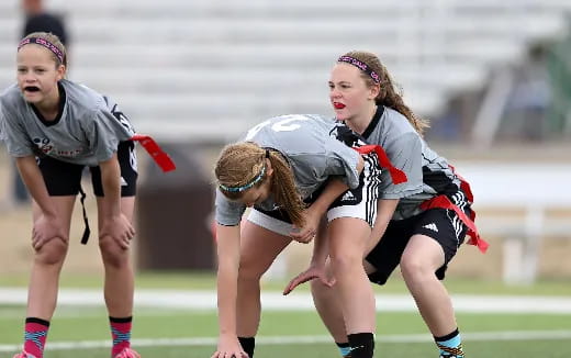 a group of women playing a sport