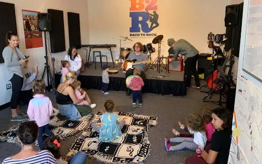 a group of people sitting in a room
