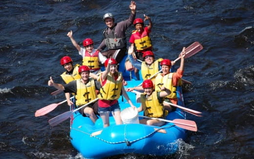 a group of people in a boat