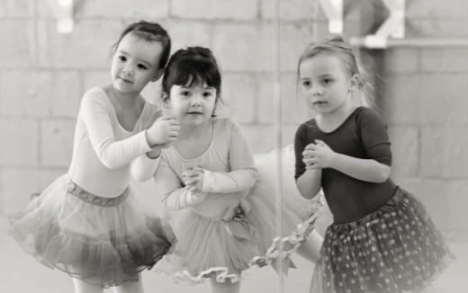 a group of girls posing for a picture