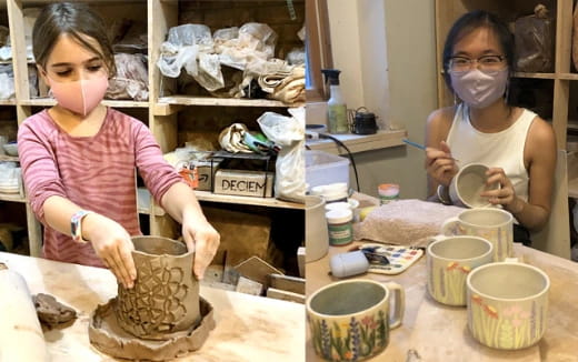 a couple of girls making clay