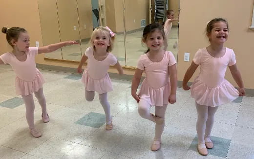 a group of girls dancing