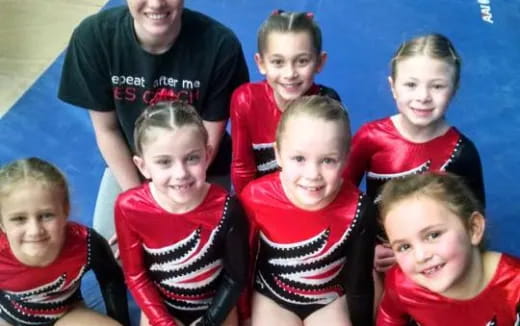 a group of children posing for a photo