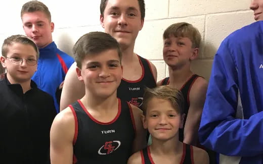 a group of people posing for a photo