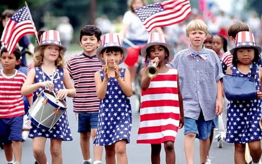 a group of people holding flags
