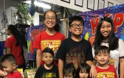 a group of people posing for a photo