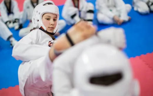 a person in a white suit