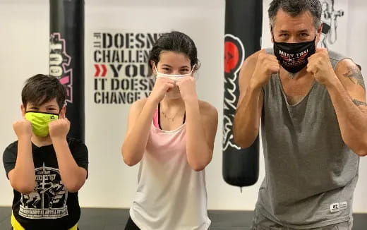 a group of people wearing masks