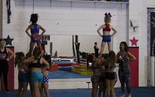 a group of women in a gym