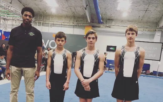 a group of men posing for a picture