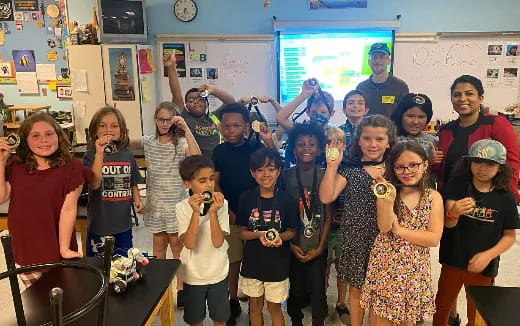 a group of people posing for a photo