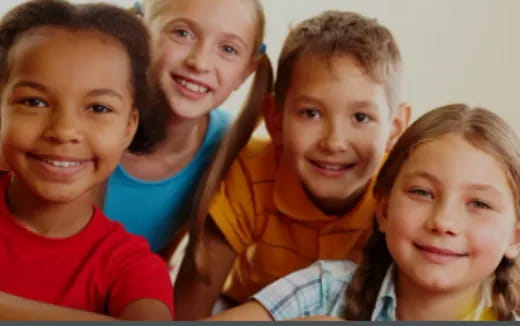 a group of children smiling