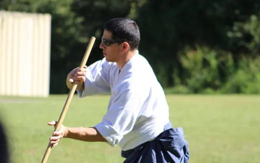 a man holding a baseball bat