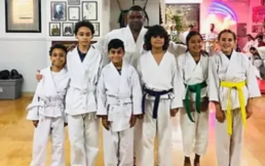 a group of people wearing karate uniforms