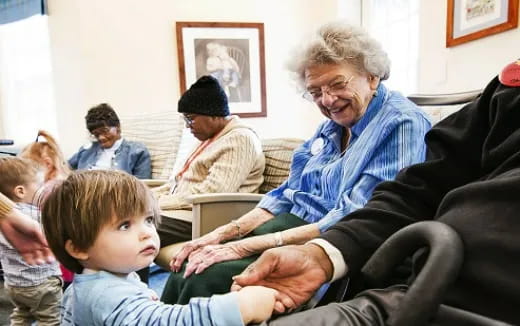 a group of people sitting in a room