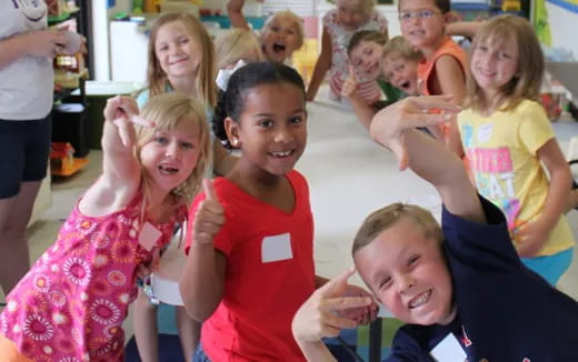 a group of children posing for a photo