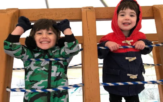 a few kids playing with a toy