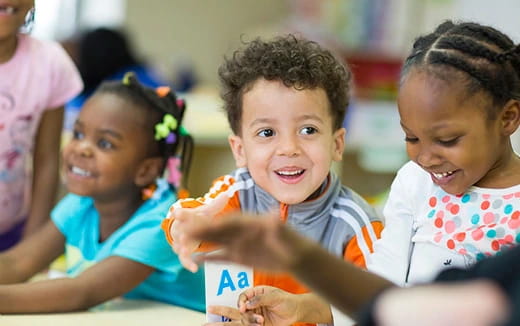 a group of children eating