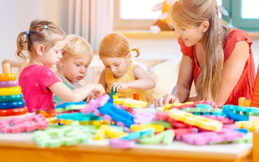 a group of children painting