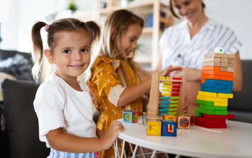 a few children playing with toys