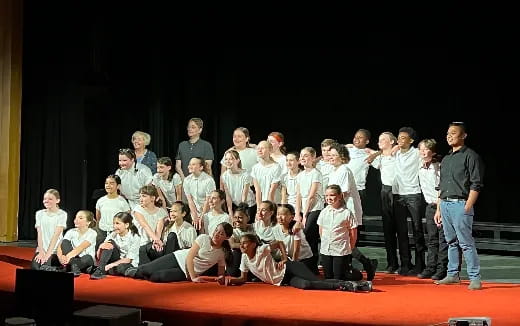 a group of people posing for a photo