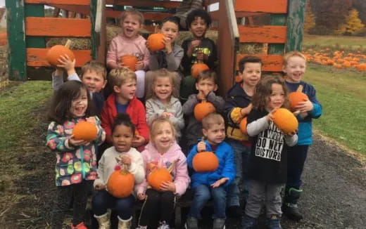 a group of children posing for a photo
