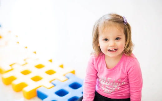 a little girl smiling