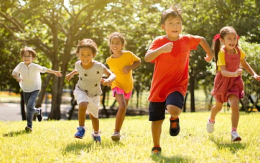 a group of children running