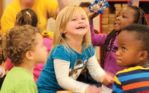 a group of children laughing