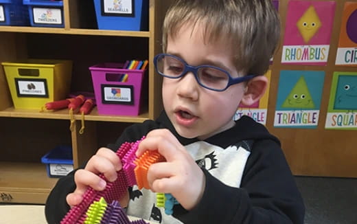 a boy wearing glasses