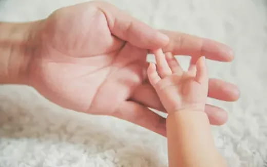 a close-up of a baby's hand