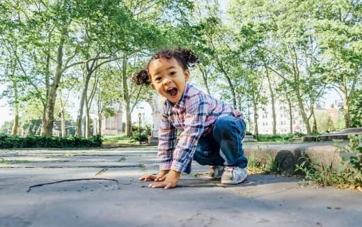 a child sitting on the ground